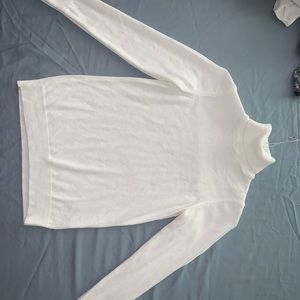 White turtleneck. True to size very comfortable